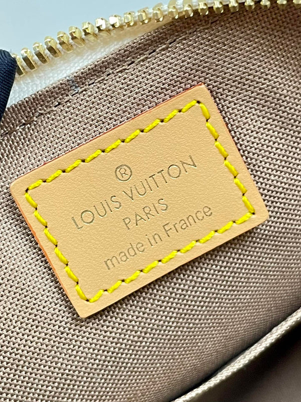 ALMA BB 25 IN WHITE MONOGRAM DUNE CANVAS GOLD HARDWARE