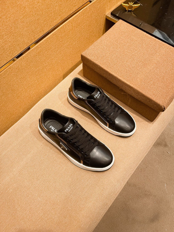 PRA SNEAKER IN BLACK CALFSKIN WITH GLOSSY GOLDEN