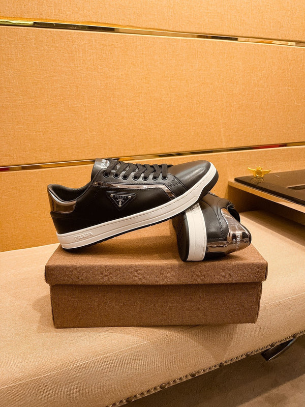 PRA SNEAKER IN BLACK CALFSKIN WITH GLOSSY GOLDEN