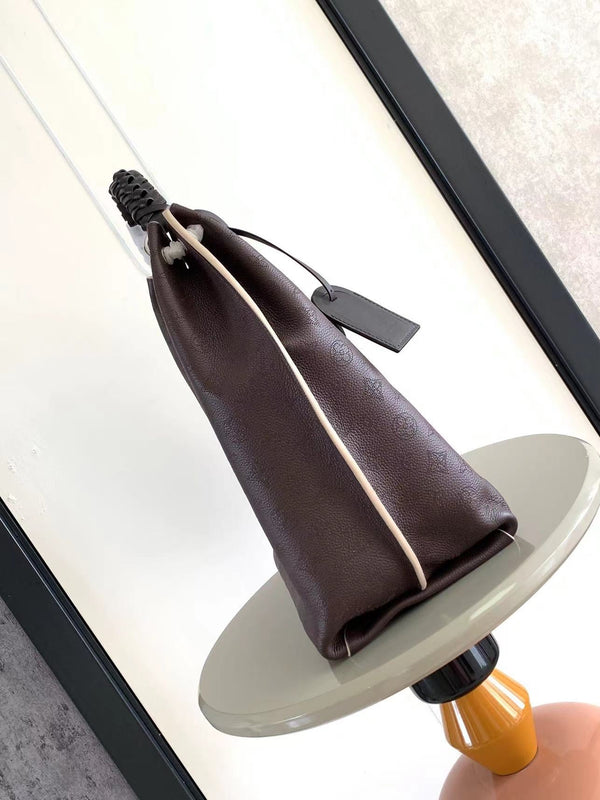 CARMEL 40 IN PELLE DI VITELLO PERFORATA CON MONOGRAMMA ROYAL RUBY