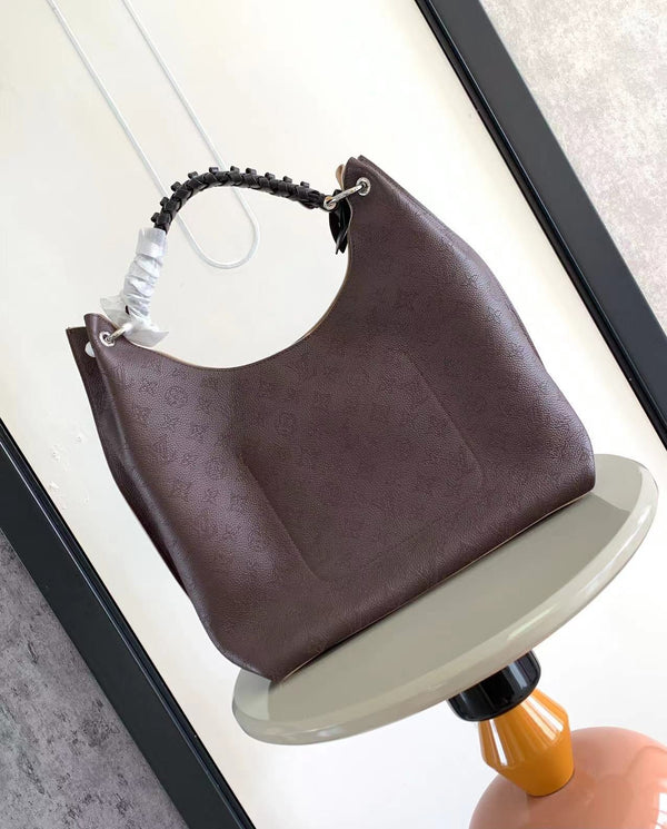 CARMEL 40 IN PELLE DI VITELLO PERFORATA CON MONOGRAMMA ROYAL RUBY