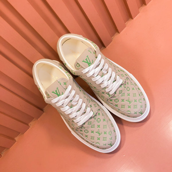 SNEAKER LV TRAINER IN PELLE DI VITELLO CON MONOGRAMMA BEIGE TAN