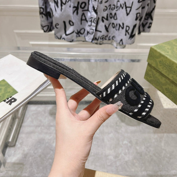 Ciabatte GG con doppia G intrecciata nere