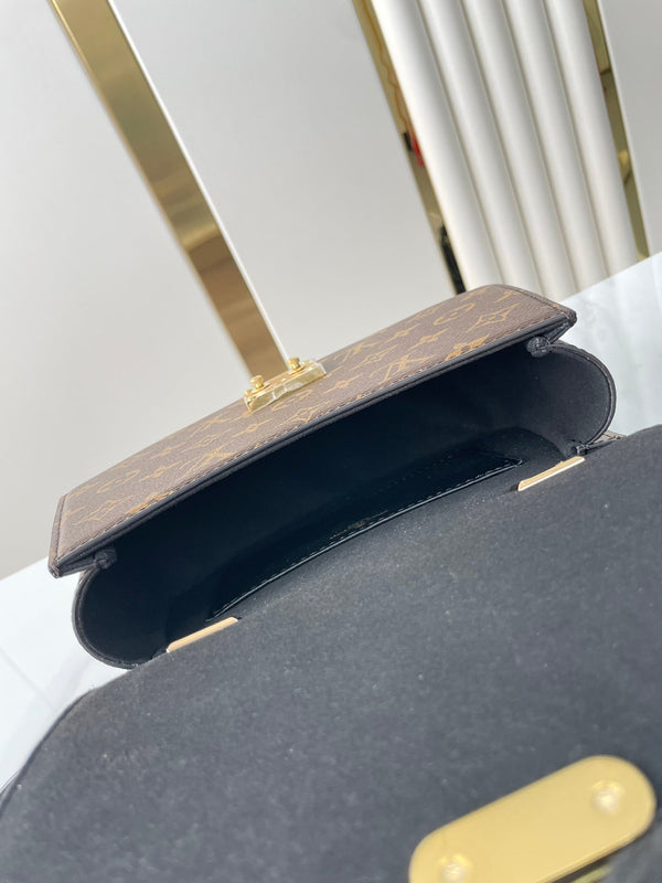 TILSITT 24 IN TELA CON MONOGRAMMA MARRONE E MONOGRAMMA RETRO FIBBIA ORO