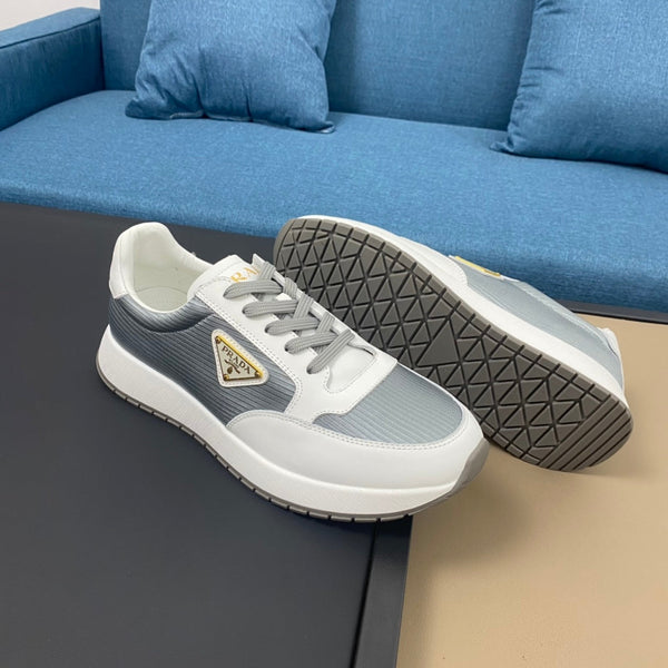 PRA SNEAKER IN WHITE CALFSKIN AND SILVER FABRIC WITH GOLDEN LOGO