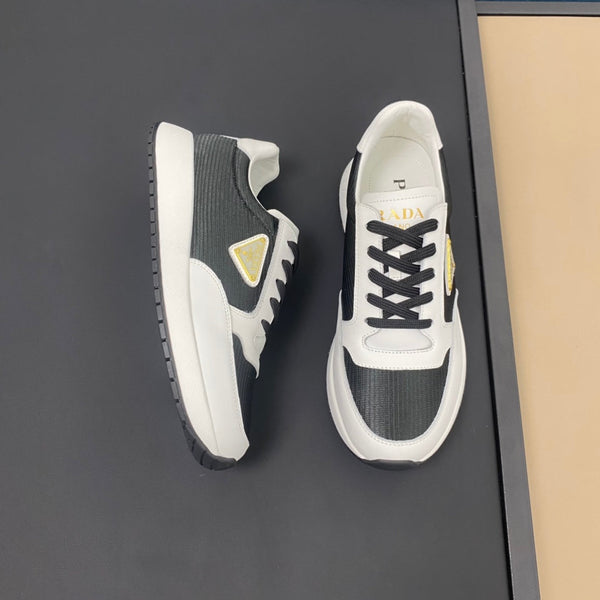 SNEAKER PRA IN VITELLO BIANCO E TESSUTO NERO CON LOGO DORATO