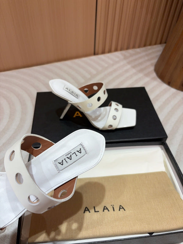 ALAIA TWO-STRAPS HIGH HEEL SANDALS IN WHITE PATENT LAMBSKIN