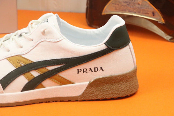 PRA SNEAKER IN WHITE CALFSKIN WITH BLACK AND YELLOW STRIPED