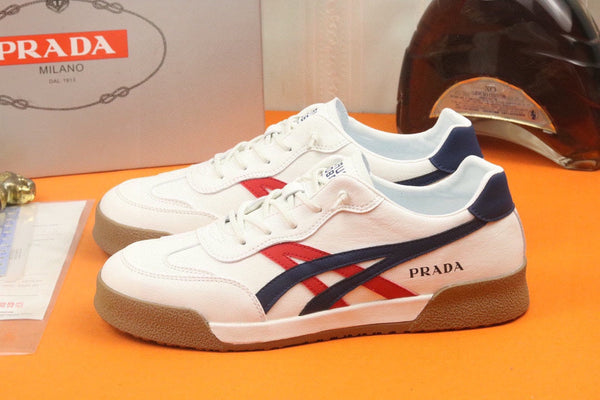 PRA SNEAKER IN WHITE CALFSKIN WITH NAVY BLUE AND RED STRIPED