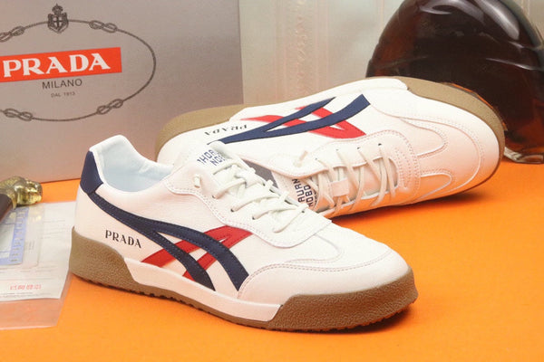PRA SNEAKER IN WHITE CALFSKIN WITH NAVY BLUE AND RED STRIPED
