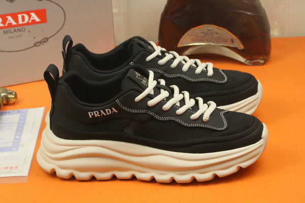 PRA SNEAKER IN BLACK CALFSKIN AND BREATHABLE MESH