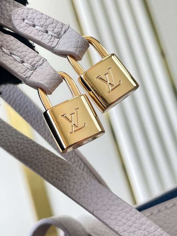 FLORE 28 IN PELLE DI VITELLO PERFORATA BIANCA