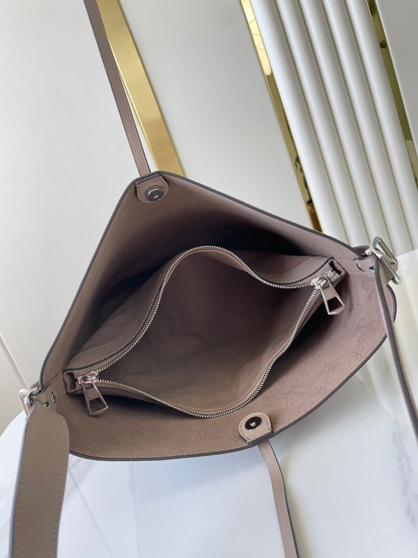 FLORA 28 IN PELLE DI VITELLO TRAFORATA PEBBLE