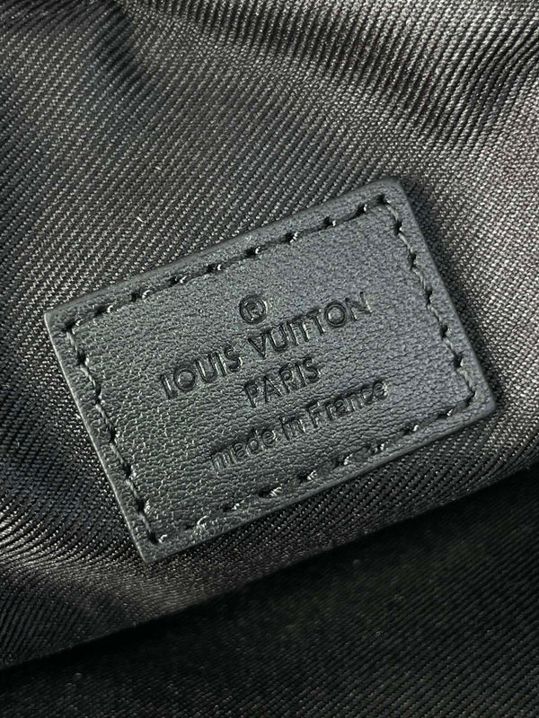 GETAWAY MESSENGER 18 IN GUN METAL MONOGRAM ECLIPSE CANVAS