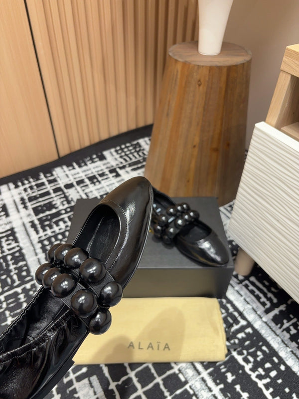 Alaila Sphere Ballet Flats In Black Glossy Calfskin 964200