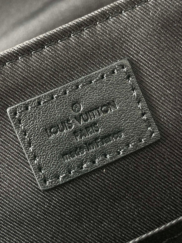 MESSENGER VOYAGER PM 33 IN GUN METAL MONOGRAM ECLIPSE CANVAS