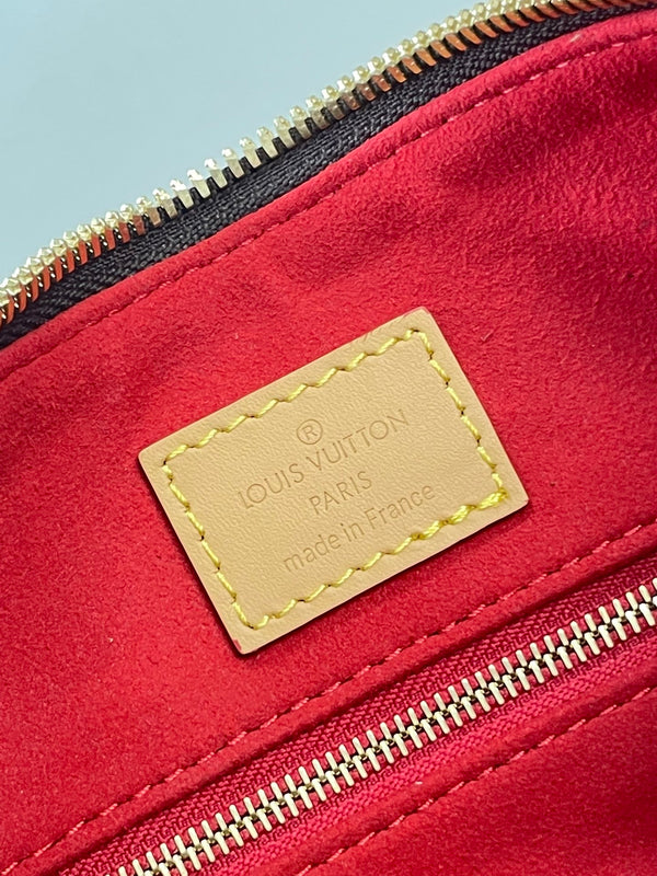 SLOUCHY PM 33 IN BROWN MONOGRAM CANVAS