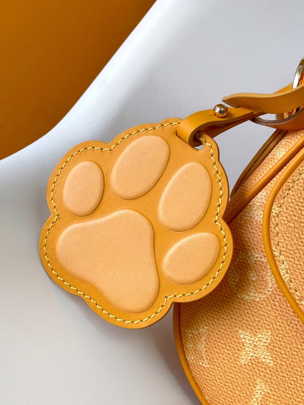 LV Montsouris Messenger 20cm Yellow Monogram Heritage Canvas & Cowhide GHW