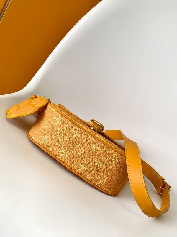 LV Montsouris Messenger 20cm Yellow Monogram Heritage Canvas & Cowhide GHW