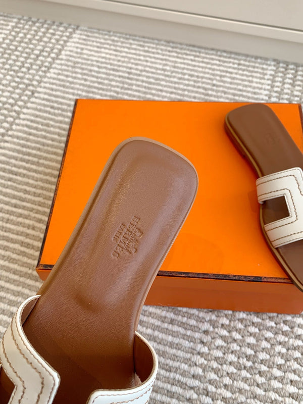 Sandalo HM Oran in pelle di pecora bianca 291395