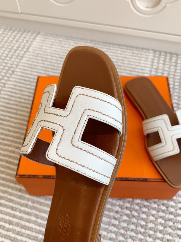 Sandalo HM Oran in pelle di pecora bianca 291395