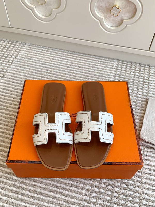 Sandalo HM Oran in pelle di pecora bianca 291395