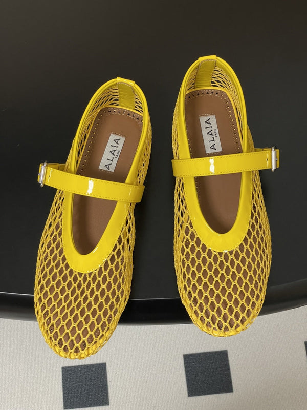 ALAIA BALLET FLATS IN YELLOW MESH FISHNET