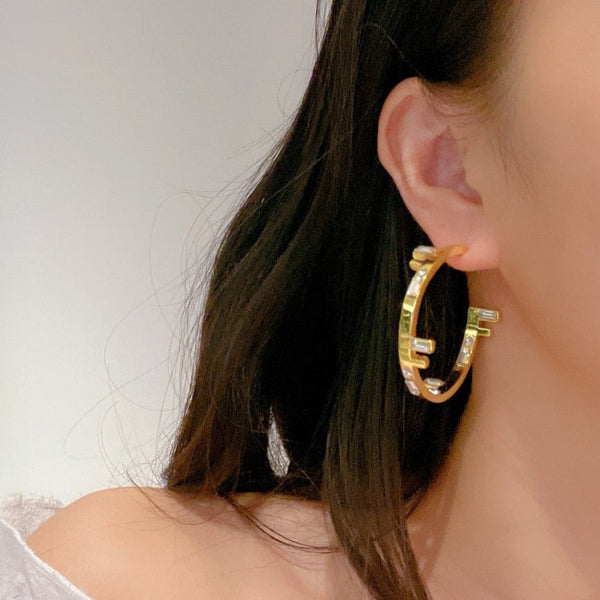 ORECCHINI A CERCHIO CON LOGO FF ORO DIAMANTE