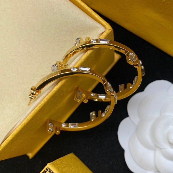 ORECCHINI A CERCHIO CON LOGO FF ORO DIAMANTE