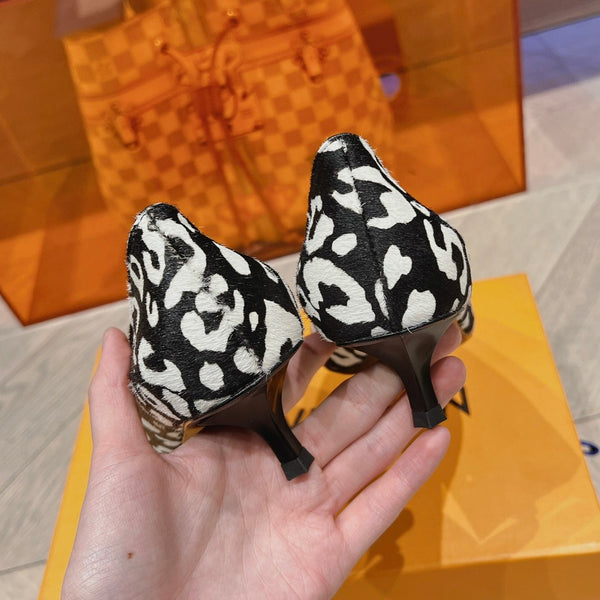 DÉCOLLETÉ LV CON TACCO BASSO BIANCO LEOPARDATO