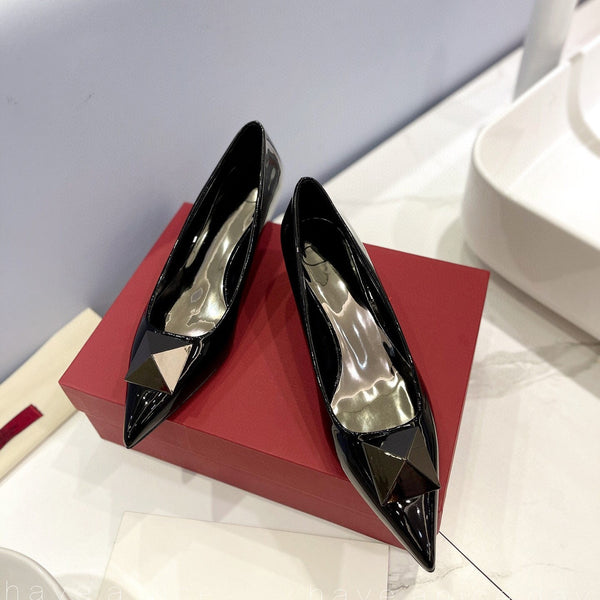 One Stud Black Patent Black Leather Pump