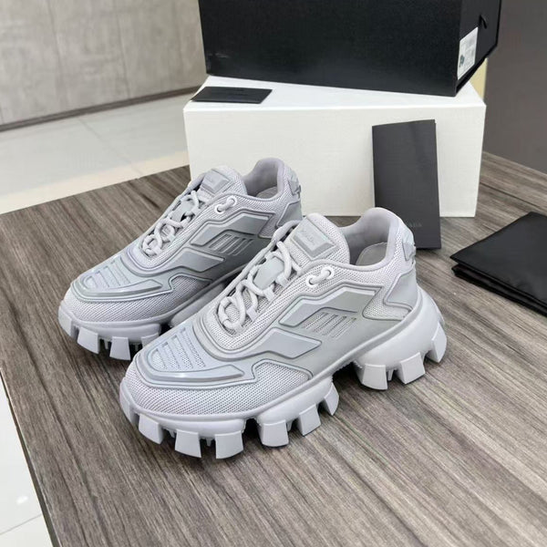 Sneakers Prada Cloudbust Thunder in tessuto lavorato a maglia bianco misto grigio perla