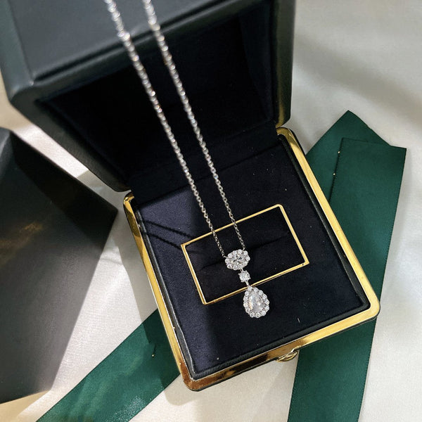 OVAL AND PEAR SHAPE SILVER DIAMOND DROP NECKLACE