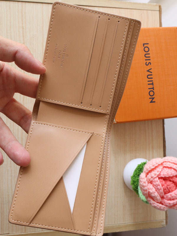 LV Multiple Wallet Monogram Grained Taurillon Cowhide