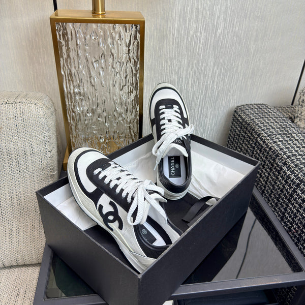 Chanel 2025 Sneaker Black and White Cowhite & Suede 507456