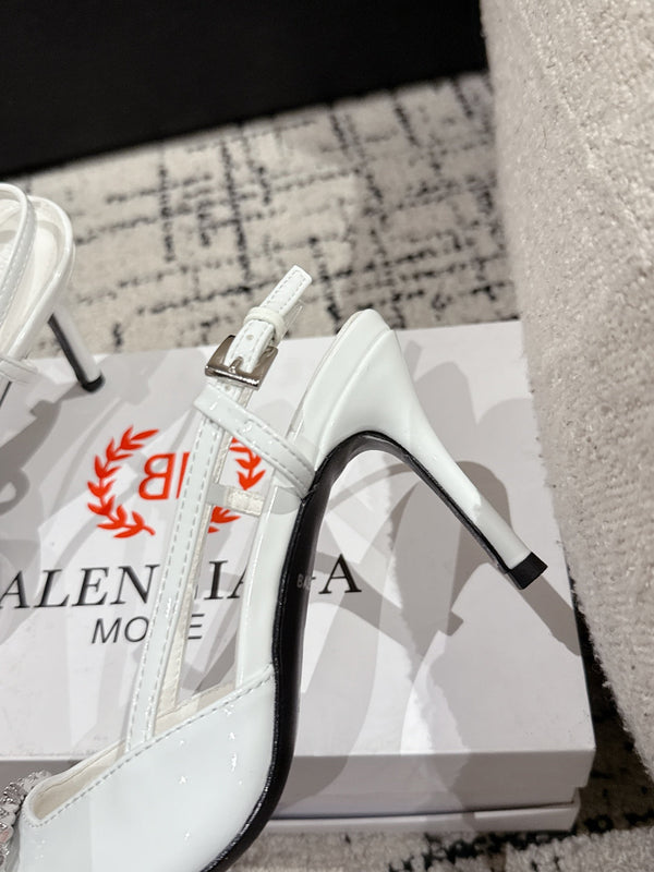 POINTED HIGH SLINGBACK IN WHITE PATENT CALFSKIN WITH CRYSTAL BUCKLE
