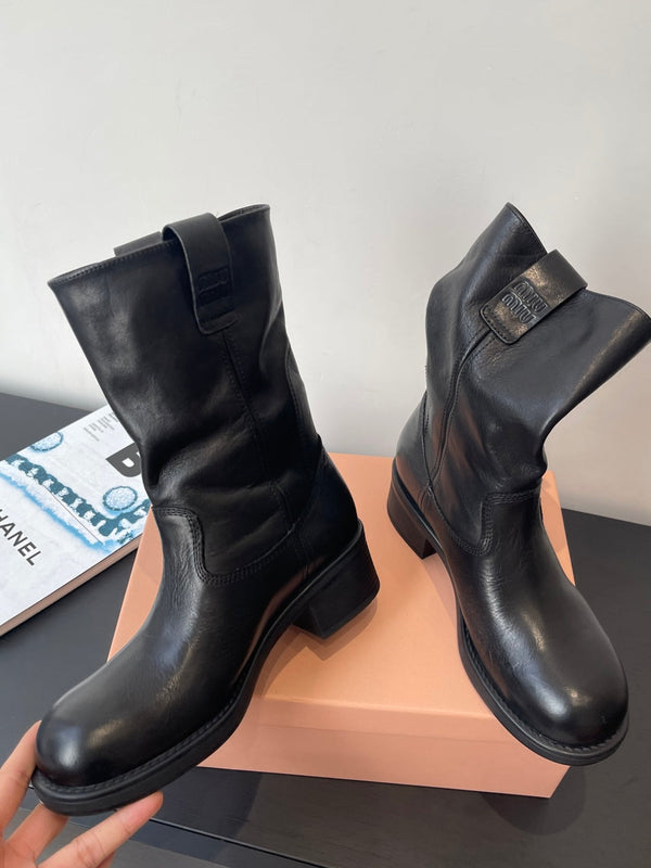 MiuMiu 26 heeled boots black cowhide 521957