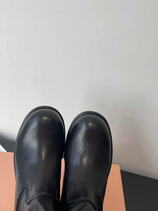 MiuMiu 26 heeled boots black cowhide 521957