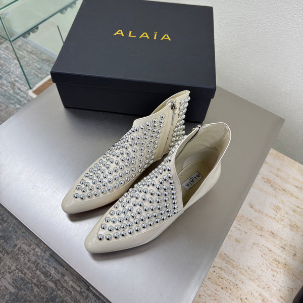 ALAIA Rivet ankle boots ivory cowhide leather 471092
