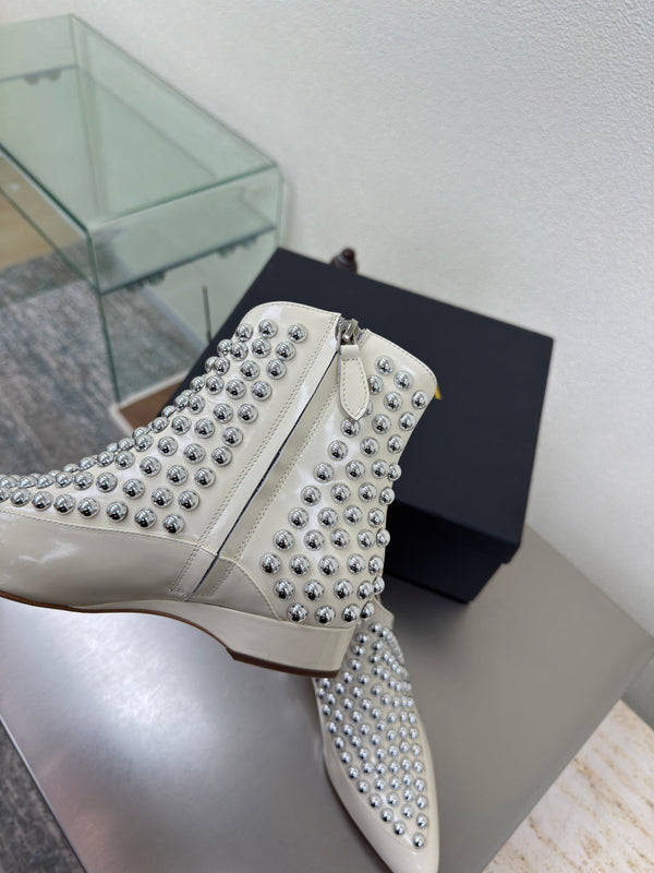 ALAIA Rivet ankle boots ivory cowhide leather 471092