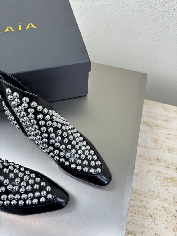 ALAIA Rivet ankle boots black cowhide leather 471093