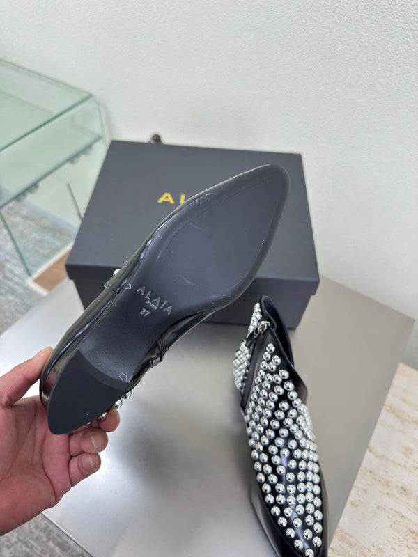 ALAIA Rivet ankle boots black cowhide leather 471093