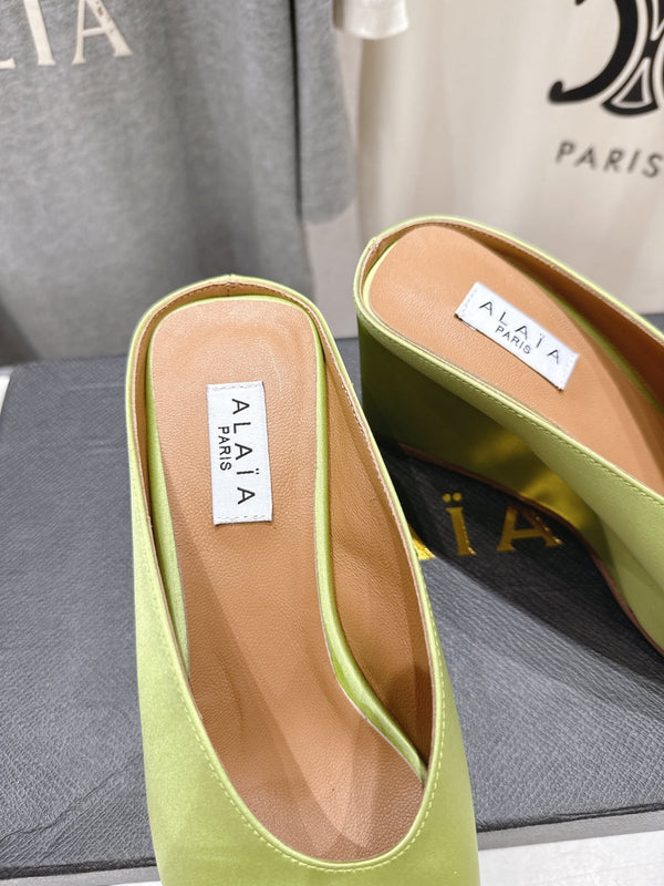 Alaia 25 Cube Wedge Mules Avocado Green Silk Sheepskin 300085