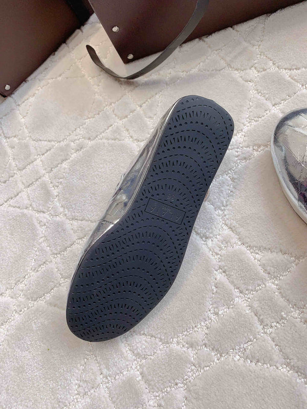 ALAIA CRISS CROSS BALLET FLAT IN SILVER LAMBSKIN