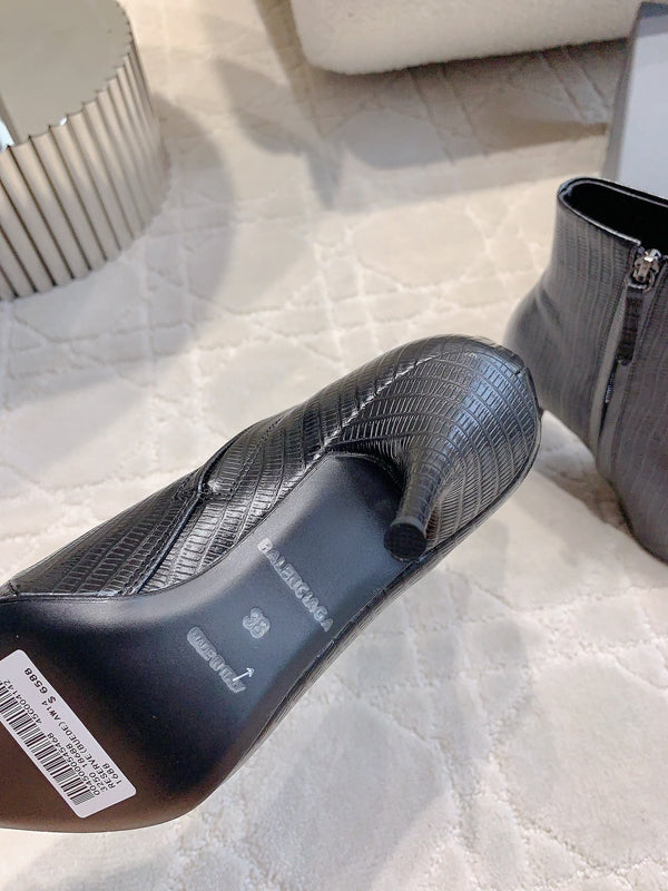 POINTED-TOE HIGH HEEL BOOTS IN BLACK LIZARD EMBOSSED CALFSKIN