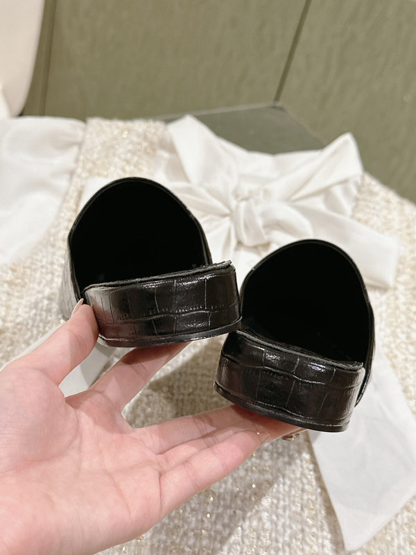 FLAT MULES IN BLACK CROCODILE EMBOSSED GLOSSY CALFSKIN