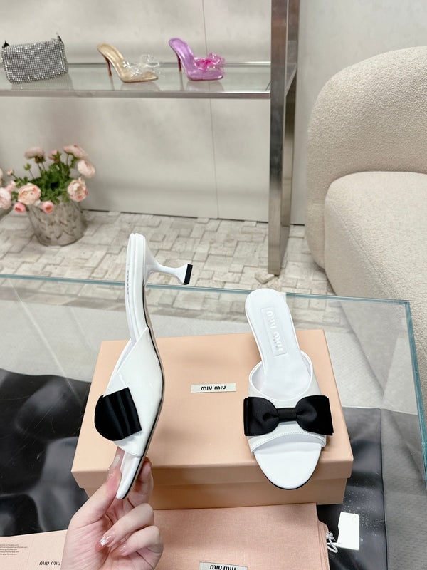Miu Mordoré Black Bows Mules 50mm White Cowhide 445522