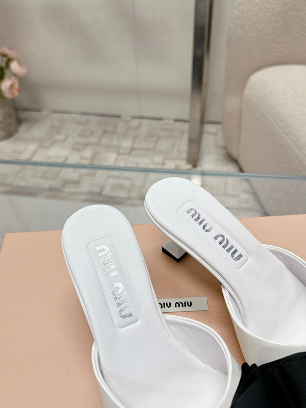 Miu Mordoré Black Bows Mules 50mm White Cowhide 445522