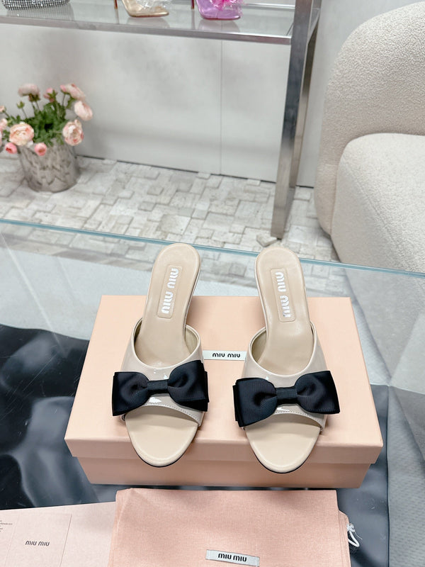 Miu Mordoré Black Bows Mules 50mm Beige Cowhide 445517