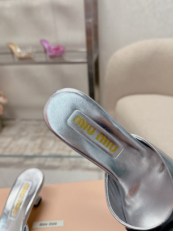 Miu Mordoré Black Bows Mules 50mm Sliver Cowhide 445519